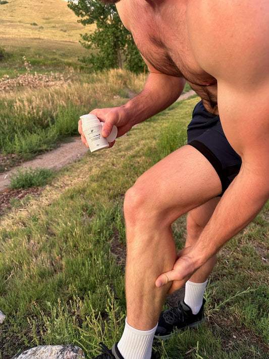 Runner preparing for back to back workout using ProHeat cream.